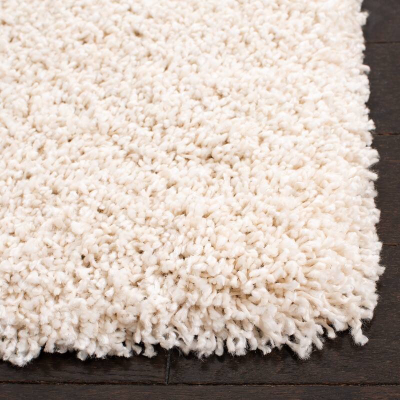 SAFAVIEH Evolution Shag Gwenaele Solid 1.8-inch Thick Rug - 8' x 10' - Ivory - Rectangle