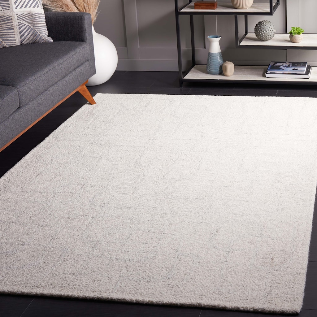 SAFAVIEH Handmade Ebony Fevzie Modern Wool Rug