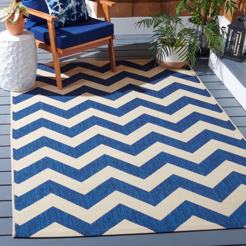 SAFAVIEH Courtyard Reeta Indoor/ Outdoor Waterproof Patio Backyard Rug - 4'x5'7" - Navy/Beige