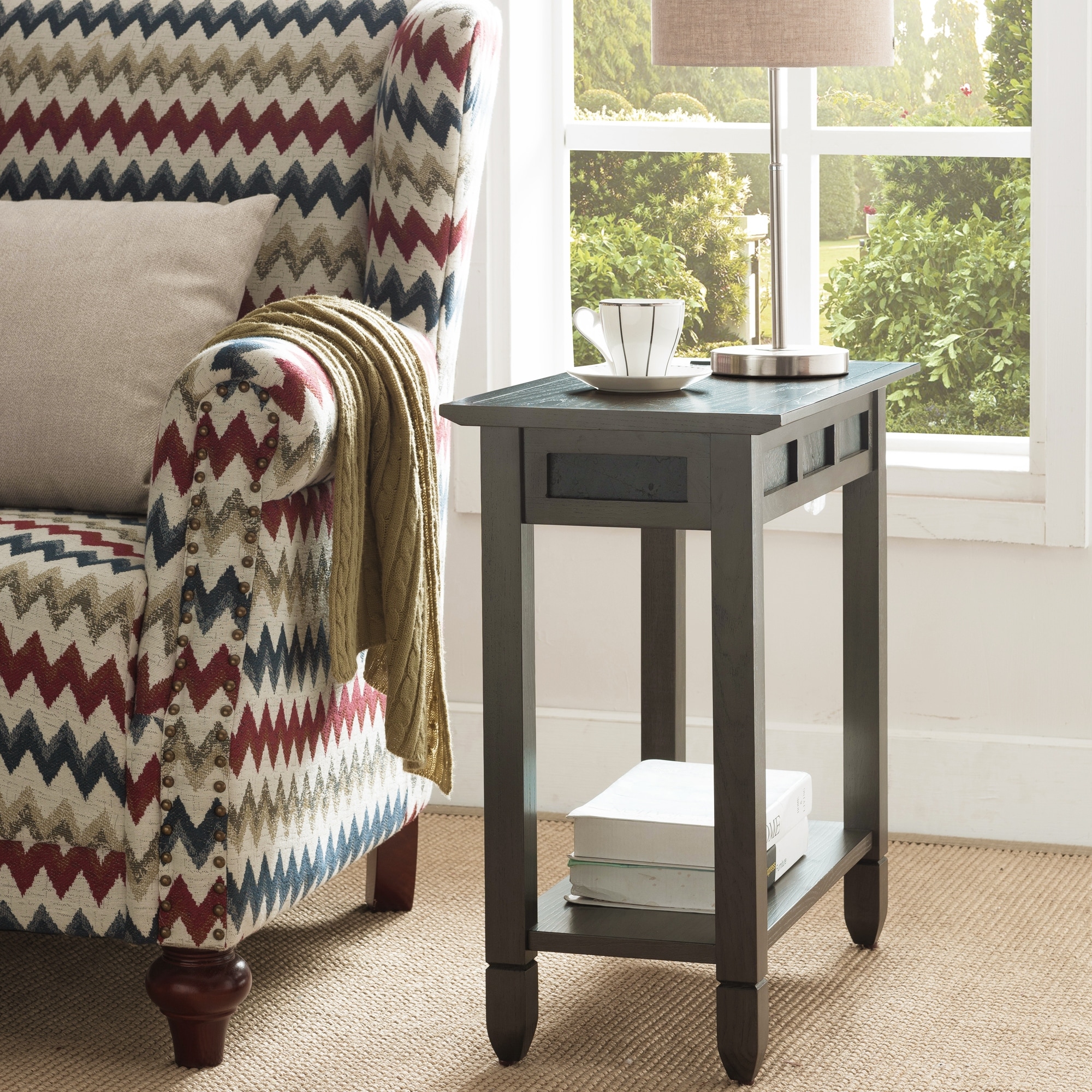 Wooden side table with drawer and lower shelf. Three square drawers on top with slate/stone insets. Thick legs, rounded feet.