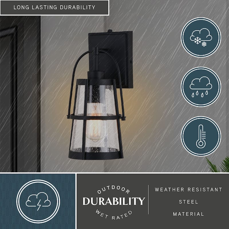 VAXCEL Portage Park 12.75 in. H 1-Light Matte Black Dusk to Dawn Sensor Outdoor Wall Sconce, Steel, Clear Seeded Glass Shade