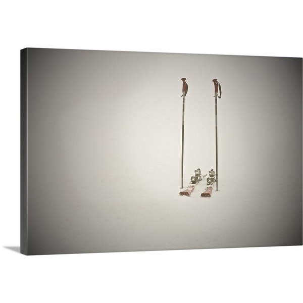 "Empty skis and poles in snow" Canvas Wall Art