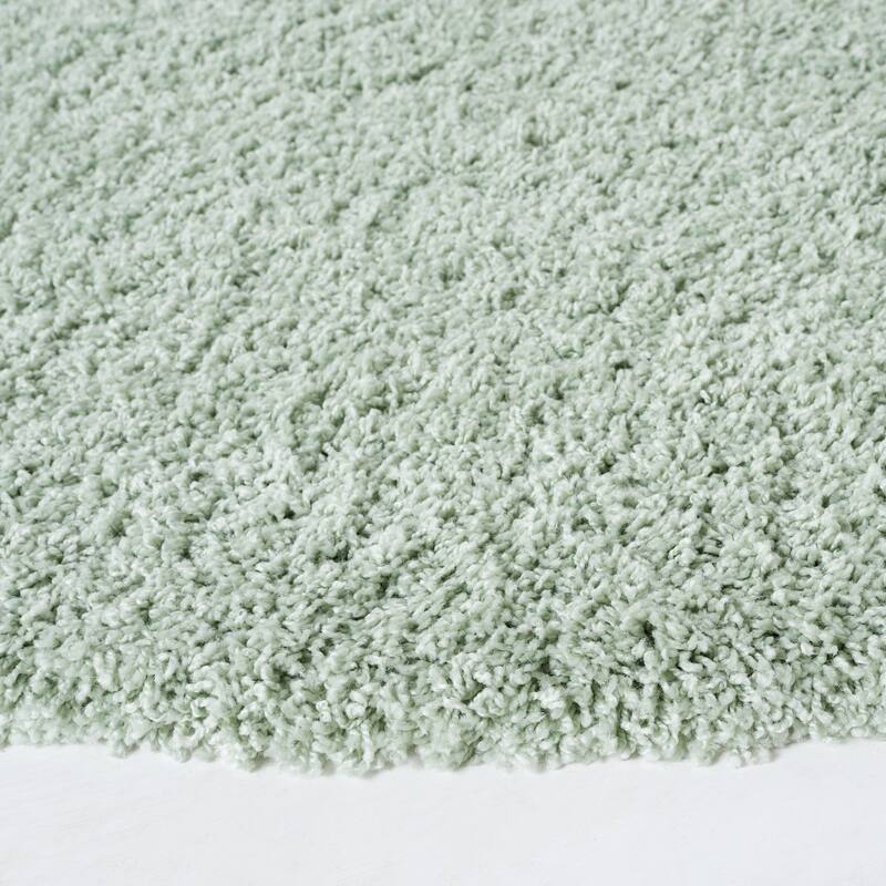 SAFAVIEH Laguna Shag Verdiana Solid Color 2-inch Thick Rug.