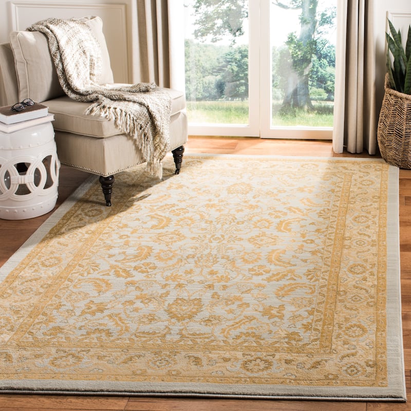 SAFAVIEH Austin Aslaug Traditional Oriental Rug - 4' x 5'7" - Light Blue/Gold