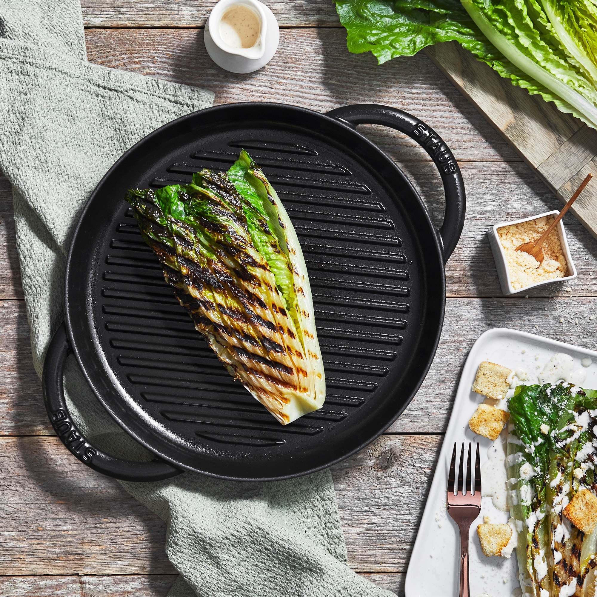https://ak1.ostkcdn.com/images/products/is/images/direct/4915b5750d3f4c95bfc59ba0419241e089470c7b/STAUB-Cast-Iron-10-inch-Pure-Grill.jpg