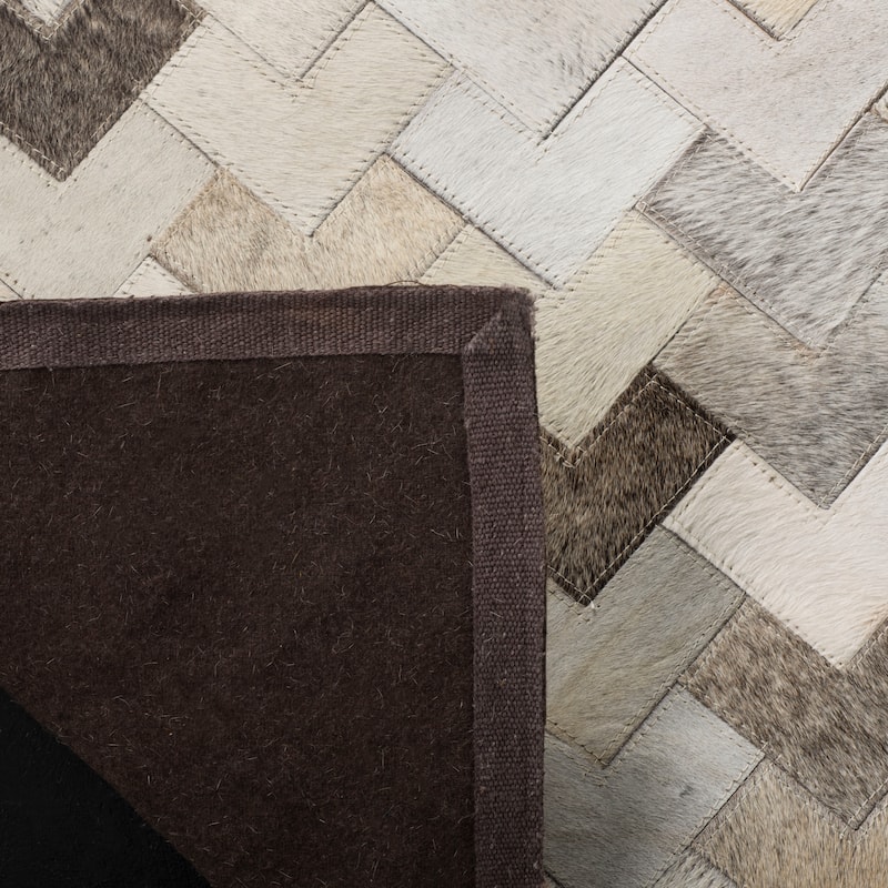 SAFAVIEH Handmade Studio Leather Momo Modern Leather Rug