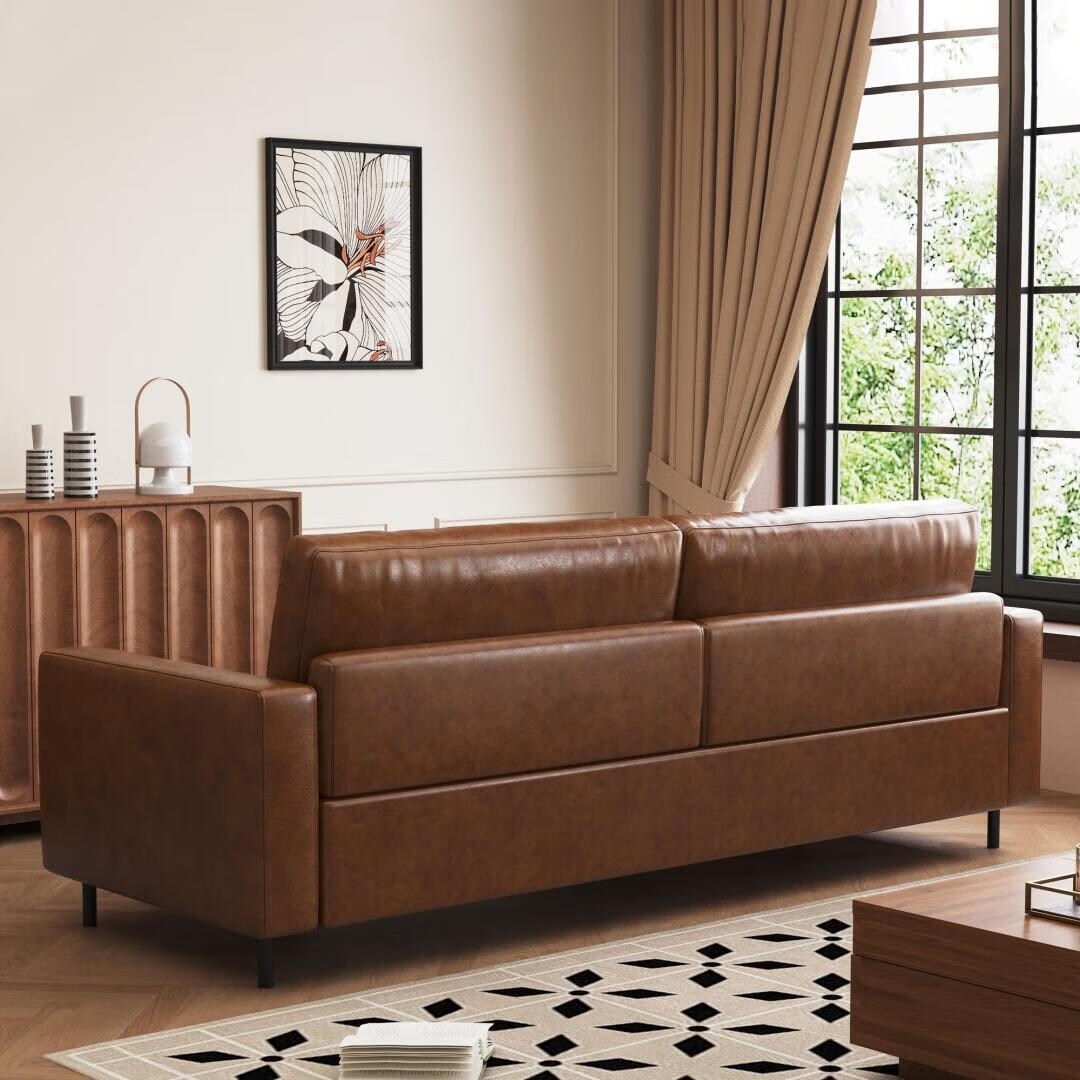 Mid-Century Modern Brown Faux Leather Sofa – 3-Seater Upholstered Couch with Bolster Pillows, Tufted Seat, and Solid Wood Frame