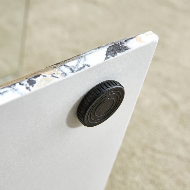 glass coffee table with marble patterned MDF legs and stainless steel decorative columns