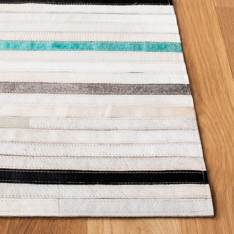 SAFAVIEH Handmade Studio Leather Borghild Modern Leather Rug