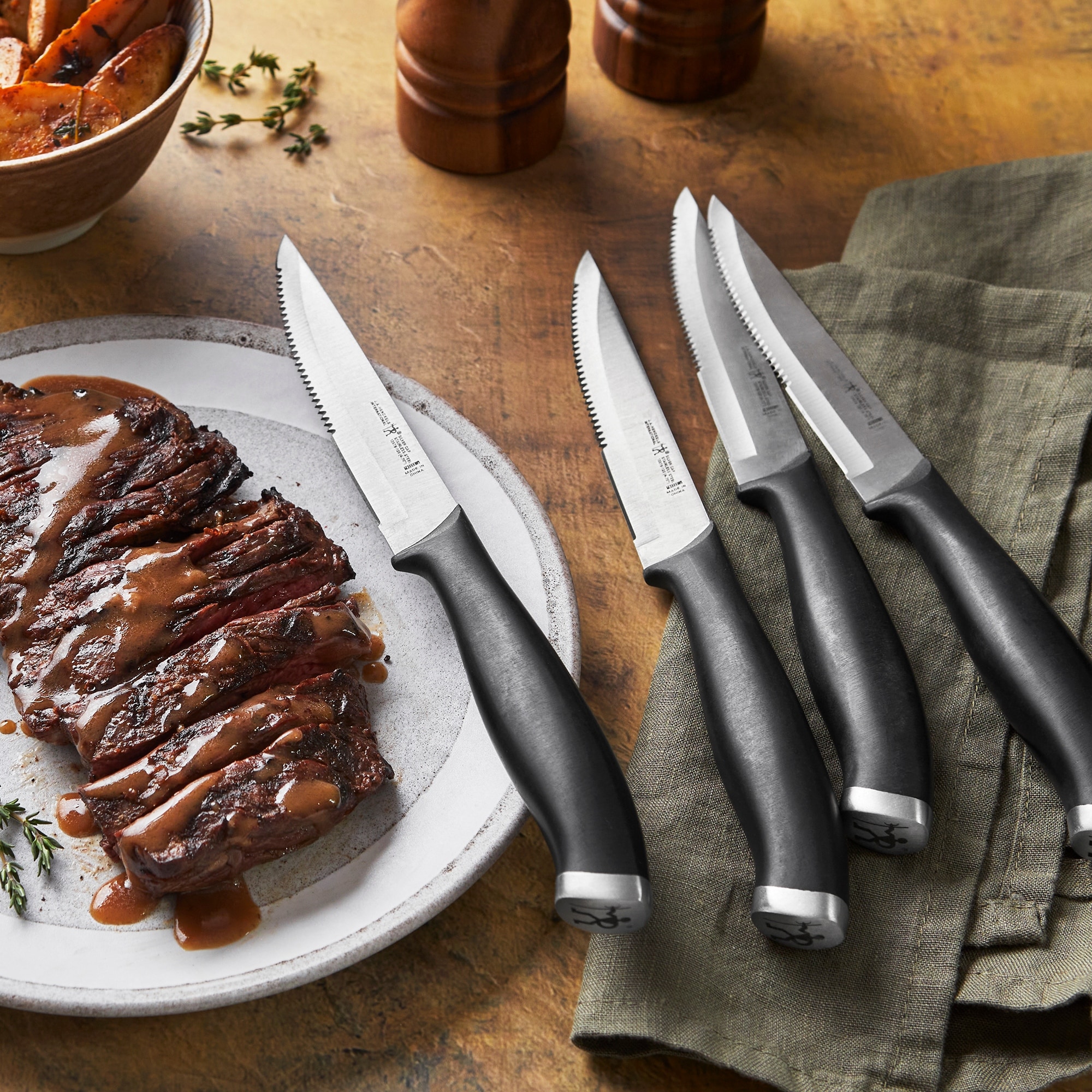 Zwilling J.A. Henckels Stainless Steel 4-Piece Serrated Mignon Steak Knife  Set