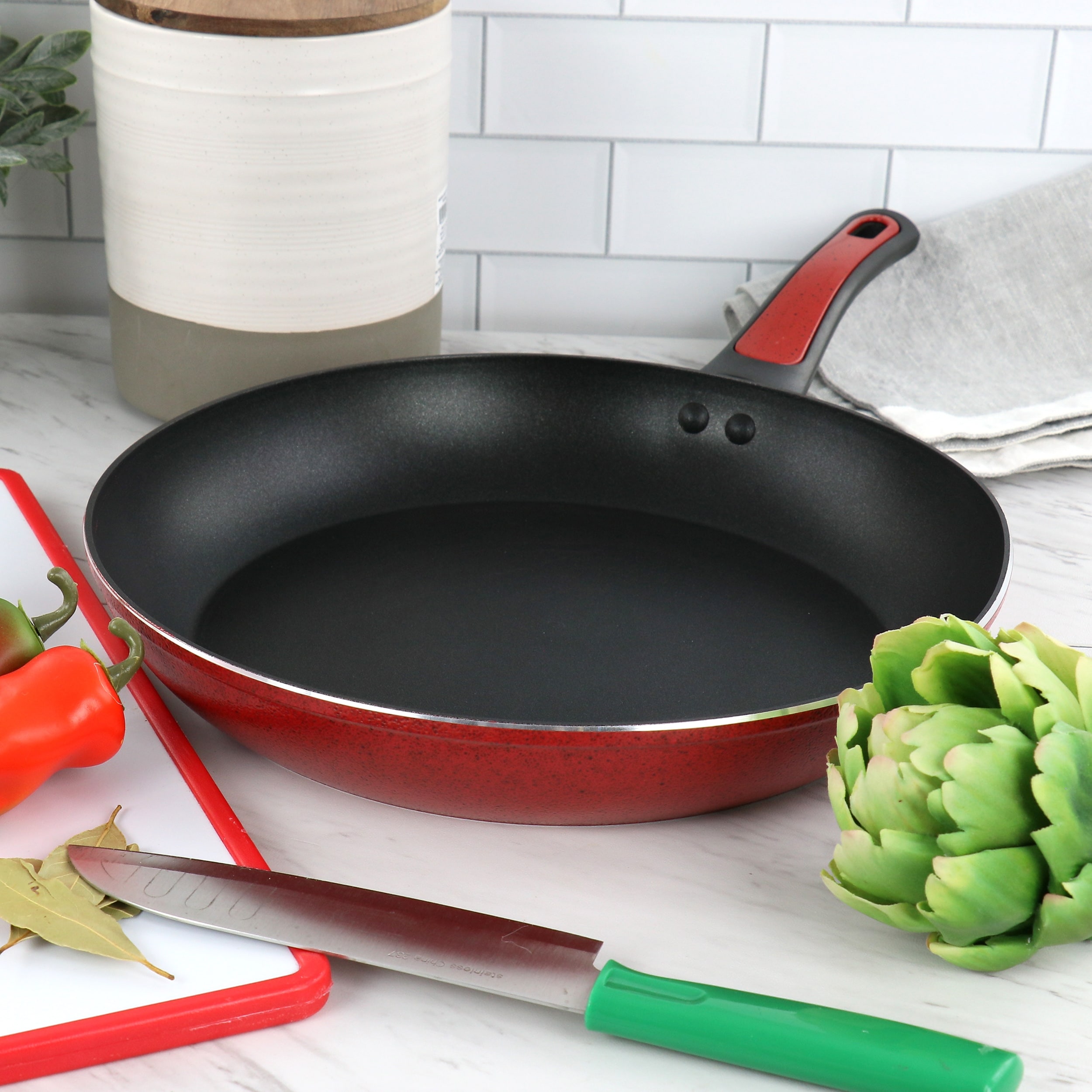 https://ak1.ostkcdn.com/images/products/is/images/direct/49cfafd0da2aaf2fee98433b9503100913893e29/Oster-Claybon-12-Inch-Nonstick-Frying-Pan-in-Speckled-Red.jpg