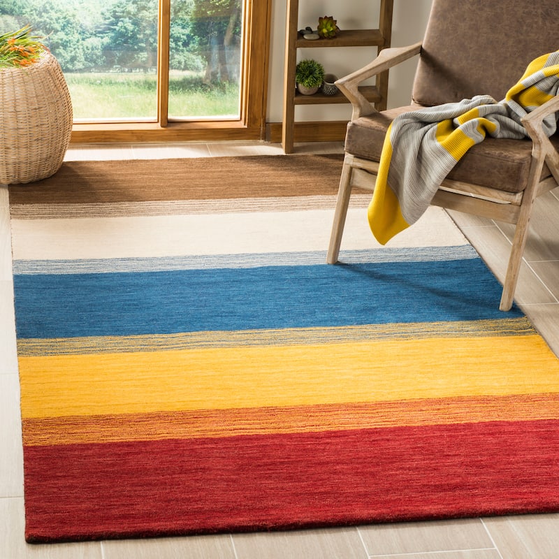 SAFAVIEH Handmade Himalaya Guro Modern Wool Rug - 4' x 6' - Orange/Multi