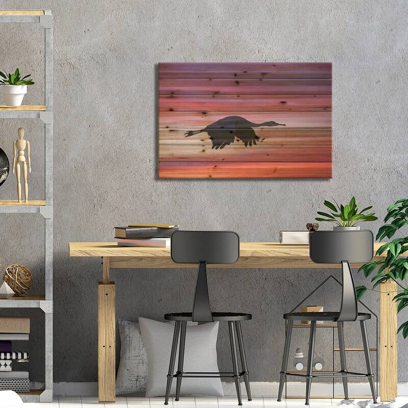 Sandhill Crane Silhouetted Flying At Sunset. Bosque Del Apache National Wildlife Refuge, New Mexico Print On Wood by Adam Jones