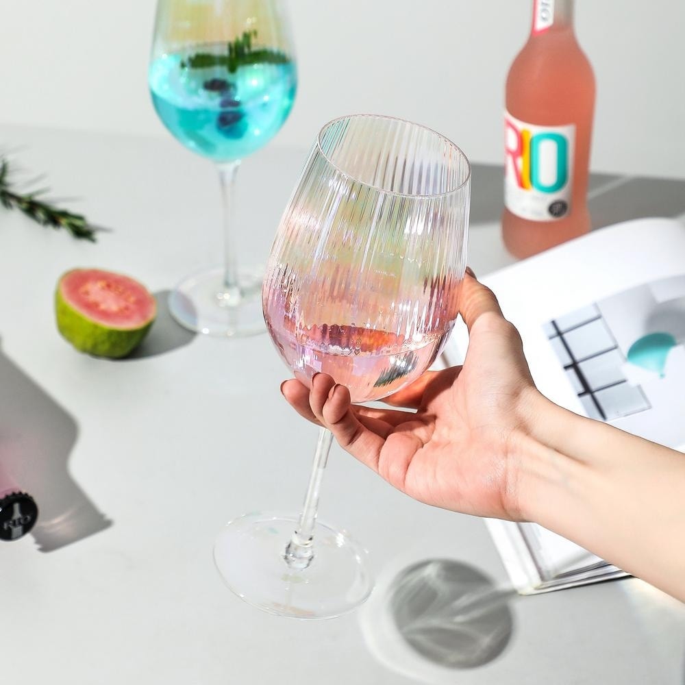 https://ak1.ostkcdn.com/images/products/is/images/direct/4a27713d0adff83d371a937373ee192565418ca8/Iridescent-Wine-Glass-set-of-2-4-6%2C-19-oz-Pretty-Cute-Cool-Rainbow-Colorful-Halloween-Glassware.jpg
