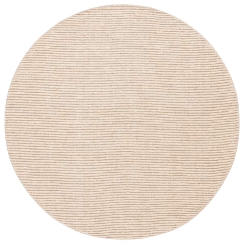 SAFAVIEH Handmade Himalaya Chrysanthemum Solid Wool Rug - 6' Round - Ivory