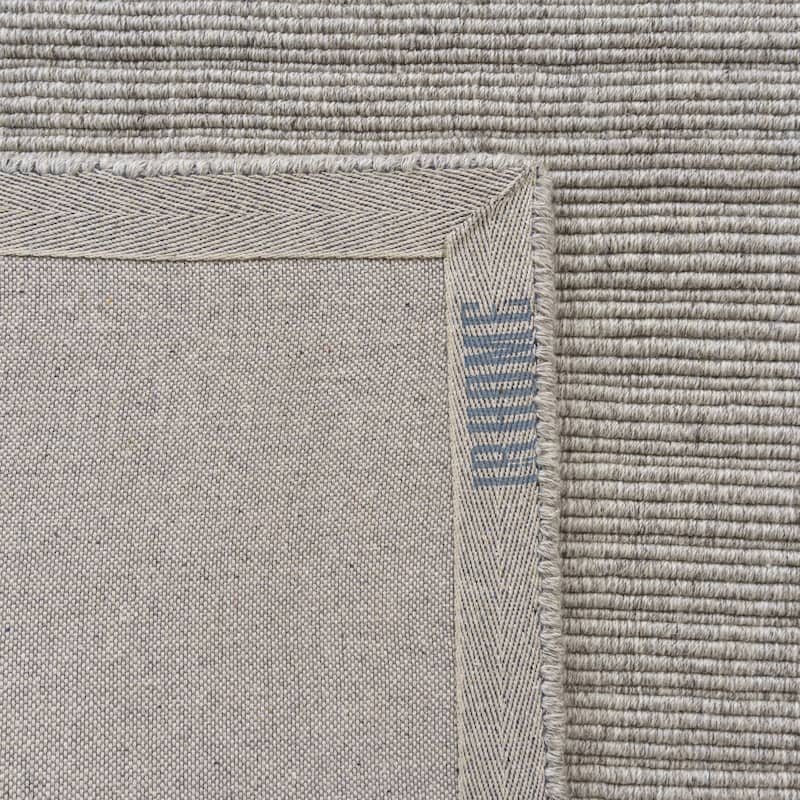 Sevita Solid Casual Hand-Woven Woolen Area Rug