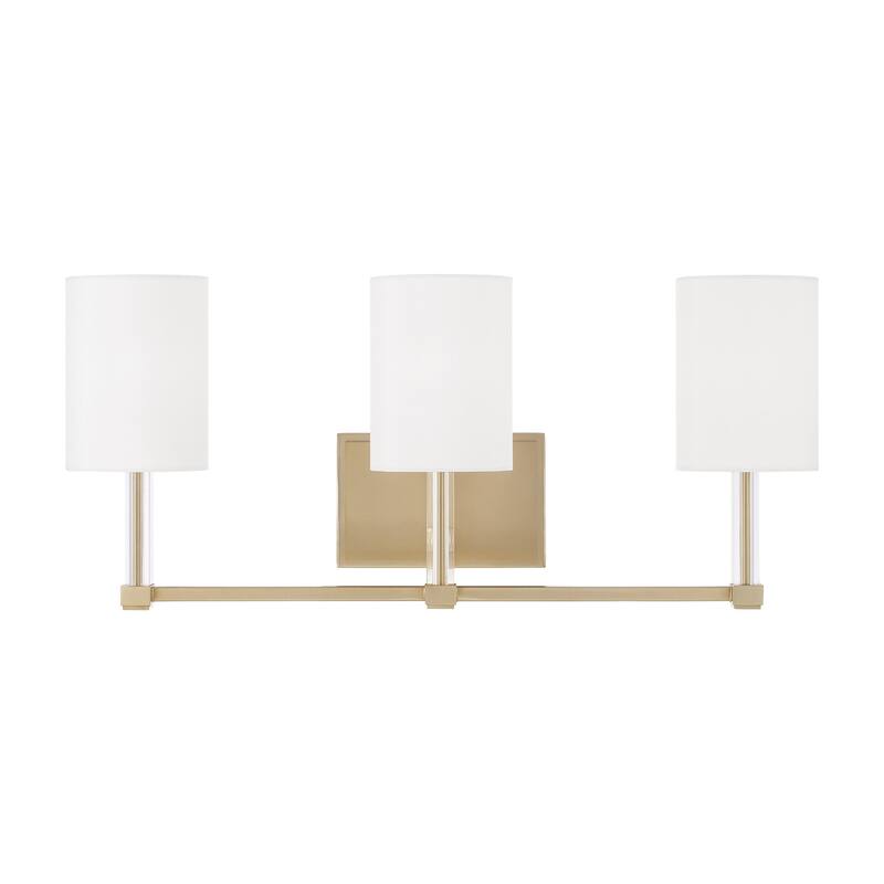 24" W x 9.75" H 3-Light Vanity in Matte Brass with Clear Acrylic Accents and Cylindrical White Fabric Shades