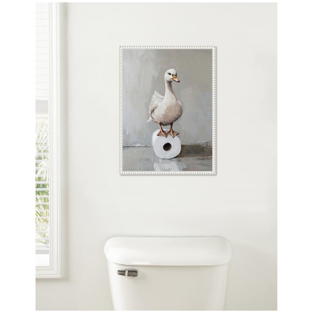Kate and Laurel Sylvie Goose Standing on a Toilet Paper Roll Bathroom Art Framed Canvas by The Creative Bunch Studio