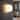 1-Light Damp Rated Brass Wall Sconce with White Glass Shade - 7 in.