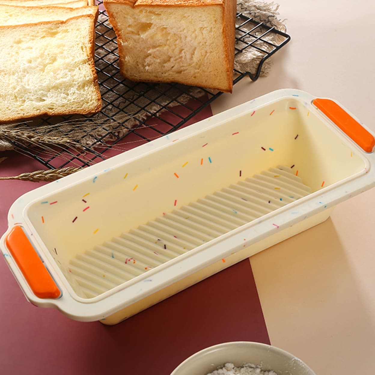 https://ak1.ostkcdn.com/images/products/is/images/direct/4a9e8057903c4cd981b51d6372be7212108bc4c4/Rectangle-NonStick-Bread-Loaf-Toast-Silicone-Baking-Pan-Tray-Mold-Diy-Bakeware.jpg