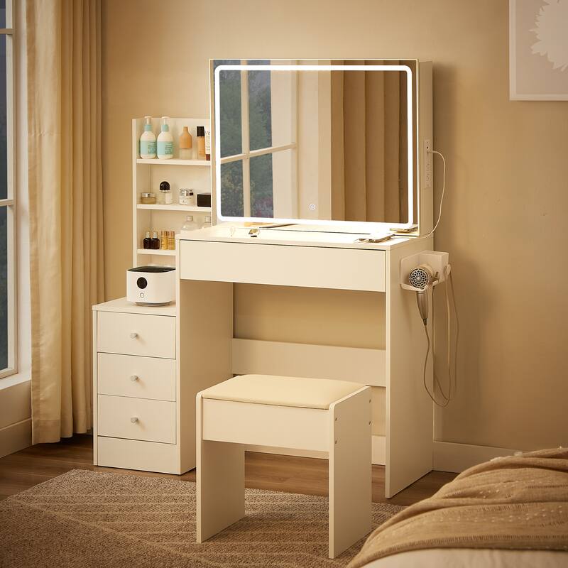 Vanity table with LED-lit mirror with power outlet and hairdryer shelving