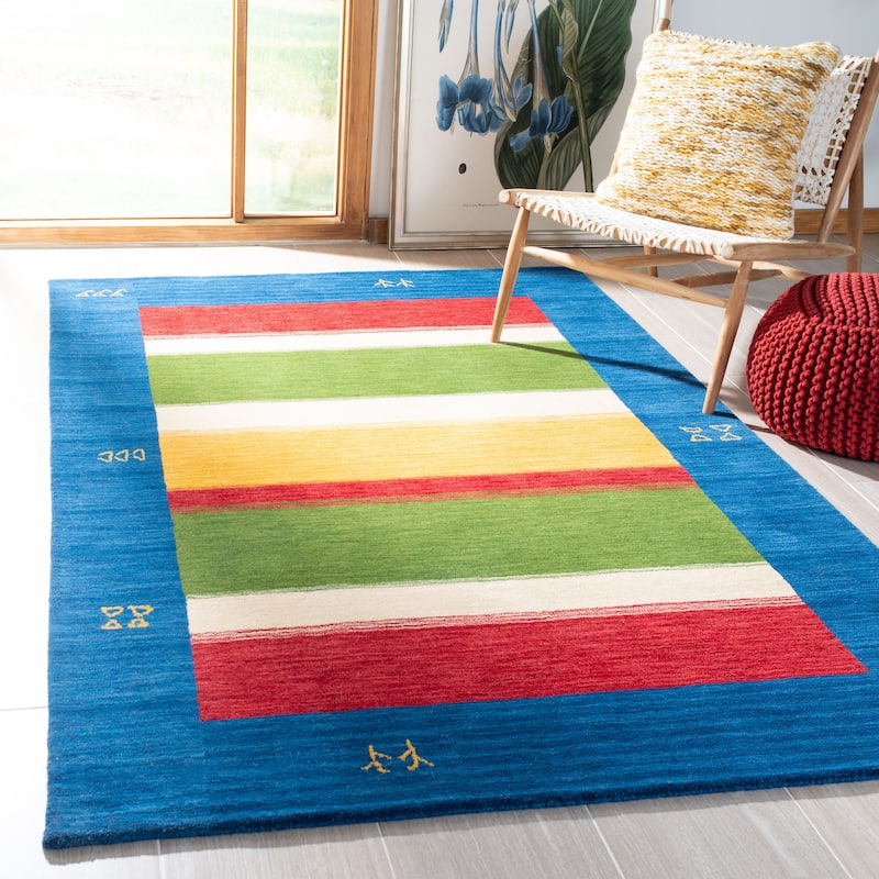 SAFAVIEH Handmade Himalaya Hand Drawn Stripe Stripe Wool Rug - 4' x 6' - Blue