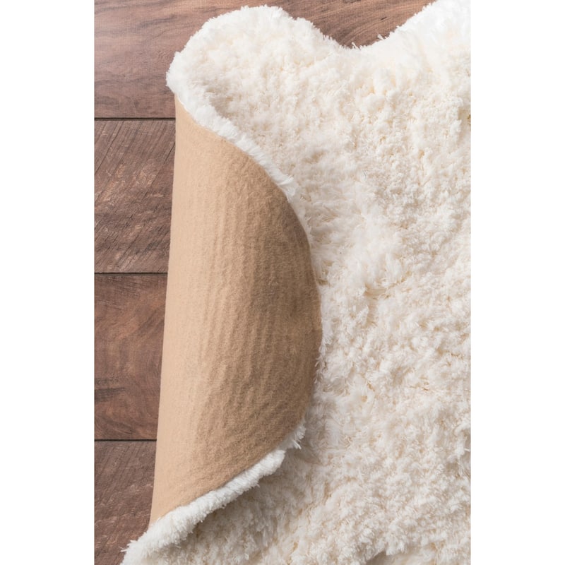 Nuloom Handmade Faux Sheepskin Shag Rug - 2' x 4'5"