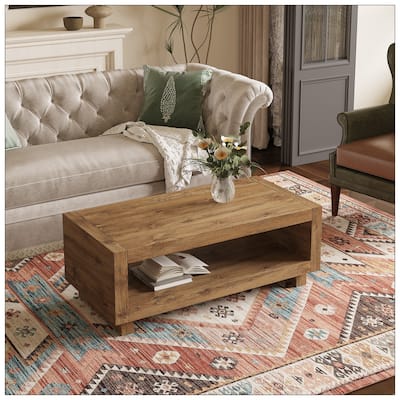 A modern minimalist MDF natural wood-colored rectangular coffee table