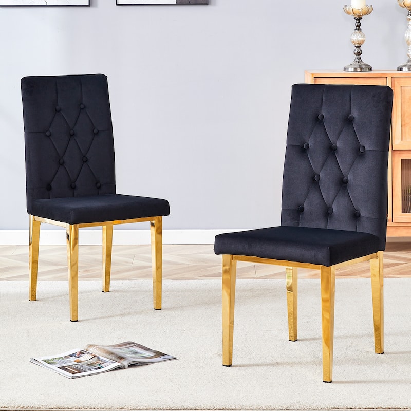 2 piece dining chairs.The gold metal legs complement the black velvet,showcasing a perfect blend