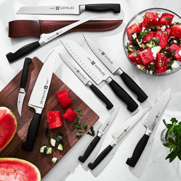 https://ak1.ostkcdn.com/images/products/is/images/direct/4b623a6e3a17ee353480da1ca222a5a5c527cd5e/ZWILLING-Four-Star-2-pc-Knife-Set.jpg?impolicy=medium