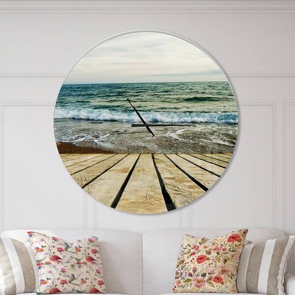 slide 2 of 10, Designart 'Wooden Pier in Waving Sea' Oversized Coastal Wall CLock