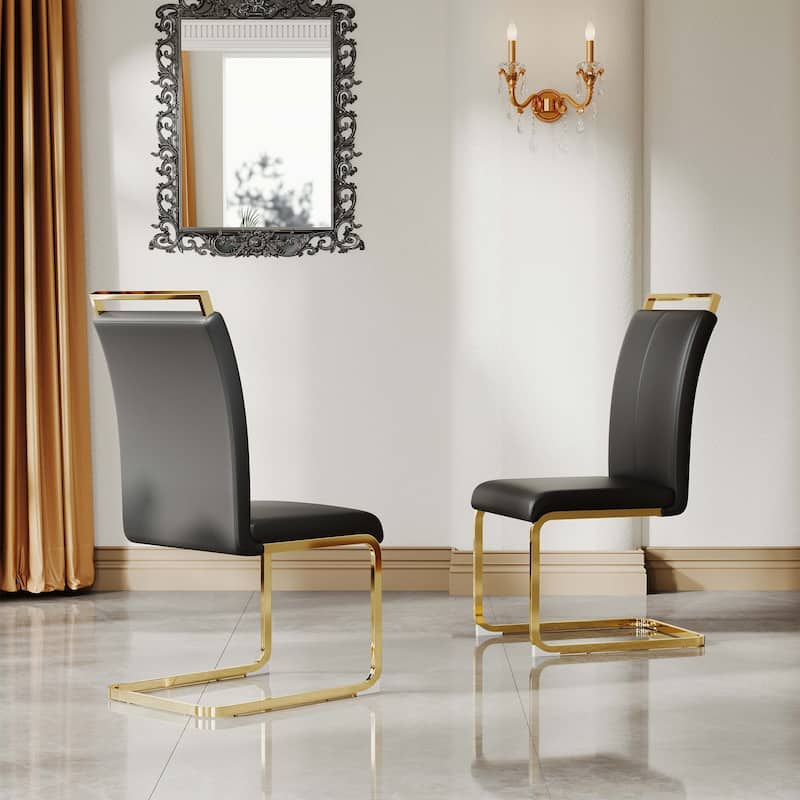 A set of 4 artificial leather dining chairs - Black