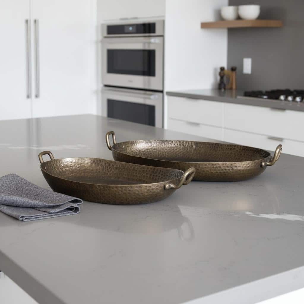 HomeRoots Set of Two Gold Oval Metal Handmade Serving Tray With Handles - 15.50 in. x 5.50 in. x 25.00 in.