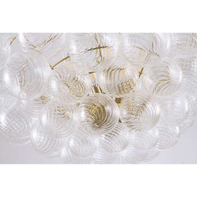 12-Light Brass Chandelier With Clear Swirl Glass Accents