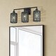 preview thumbnail 12 of 14, Livex Lighting 3-light Black Finish Vanity Sconce, 14043-04 - 23" W x 11" H x 6.5" EXT