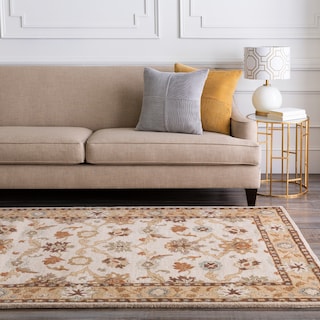 Handmade Nick Bordered Wool Area Rug