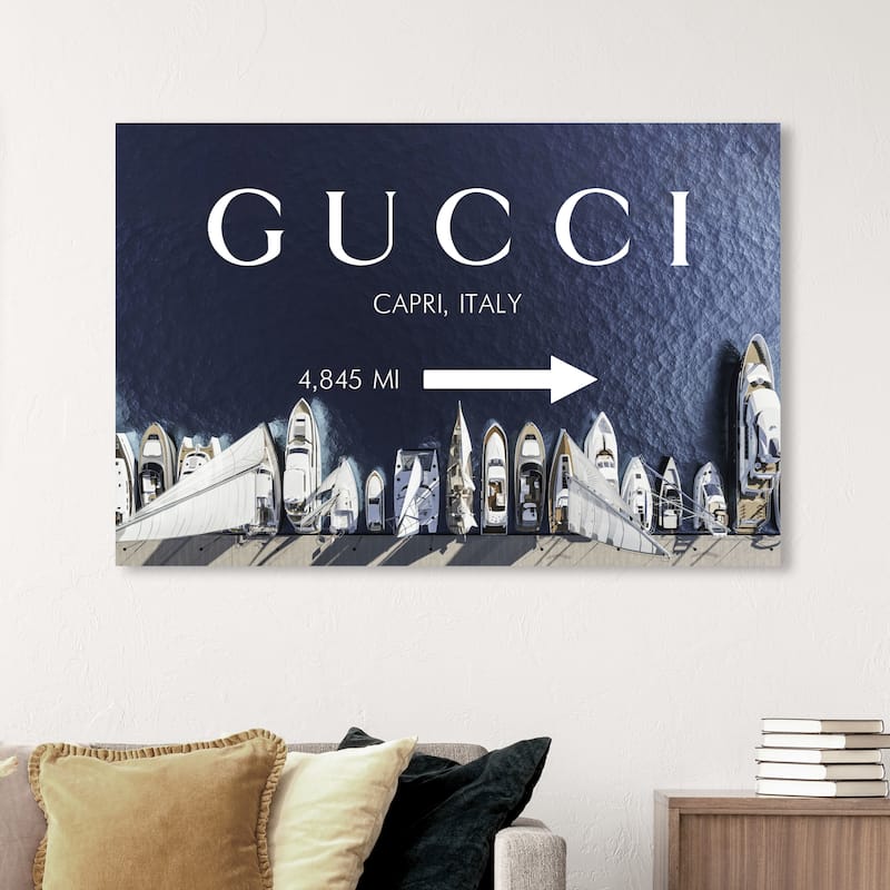Wynwood Studio Fashion and Glam Capri Road Sign Black and Beige Nautical & Coastal Wall Art Canvas Print - 36 x 54