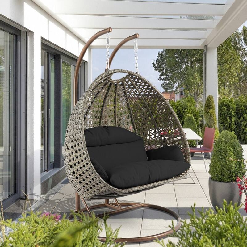 LeisureMod Modern 2-Person Egg Hanging Swing Chair with Beige Wicker, Oxford Fabric Cover, Patio Hammock Lounger and Cushions