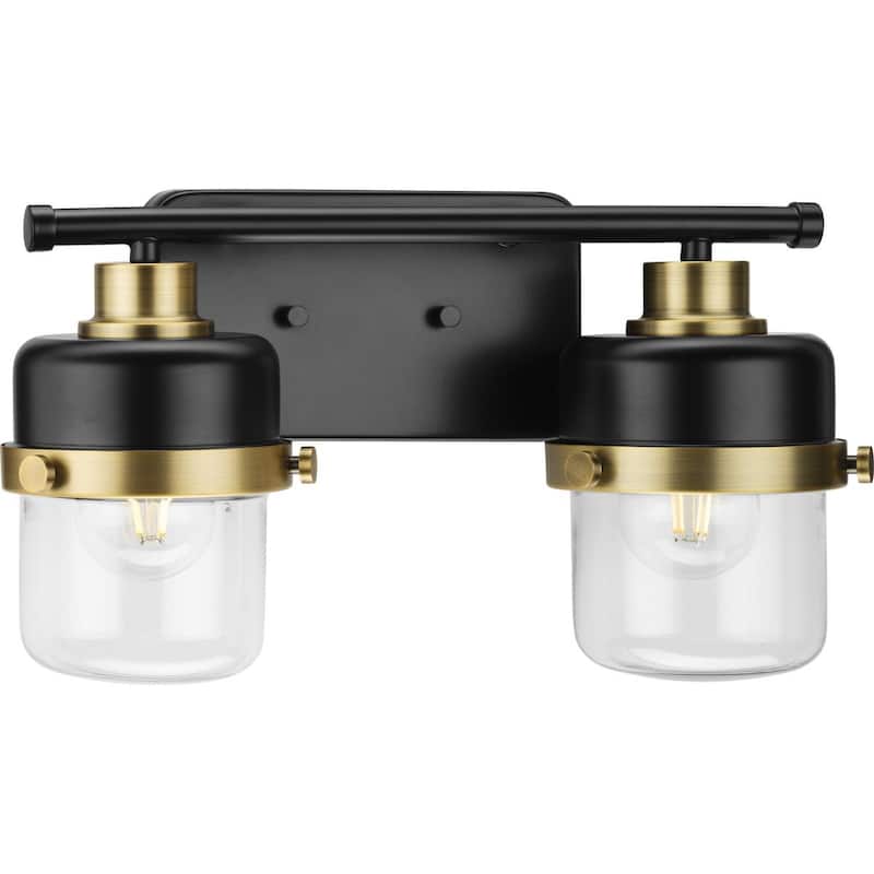 Beckner Collection Two-Light Matte Black Clear Glass Urban Industrial Bath Light with Vintage Brass Accents - 14.62 in x 6.37 in x 8.37 in