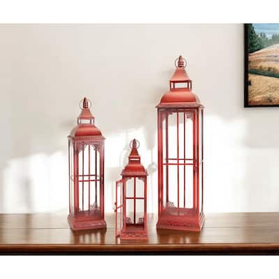 Set of Three Red Glass and Metal Ornate Floor Lantern Candle Holders