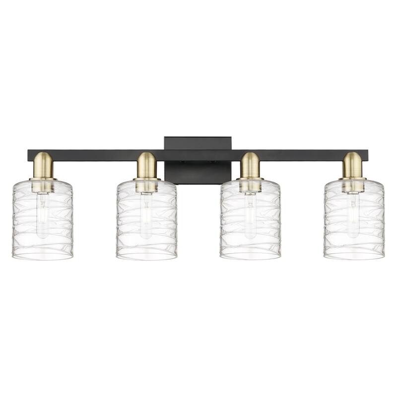 Innovations Lighting Endless Possibilities Arcadia - Cobbleskill - 4 Light 32" Bath Vanity Light - Deco Swirl/Black Antique Brass