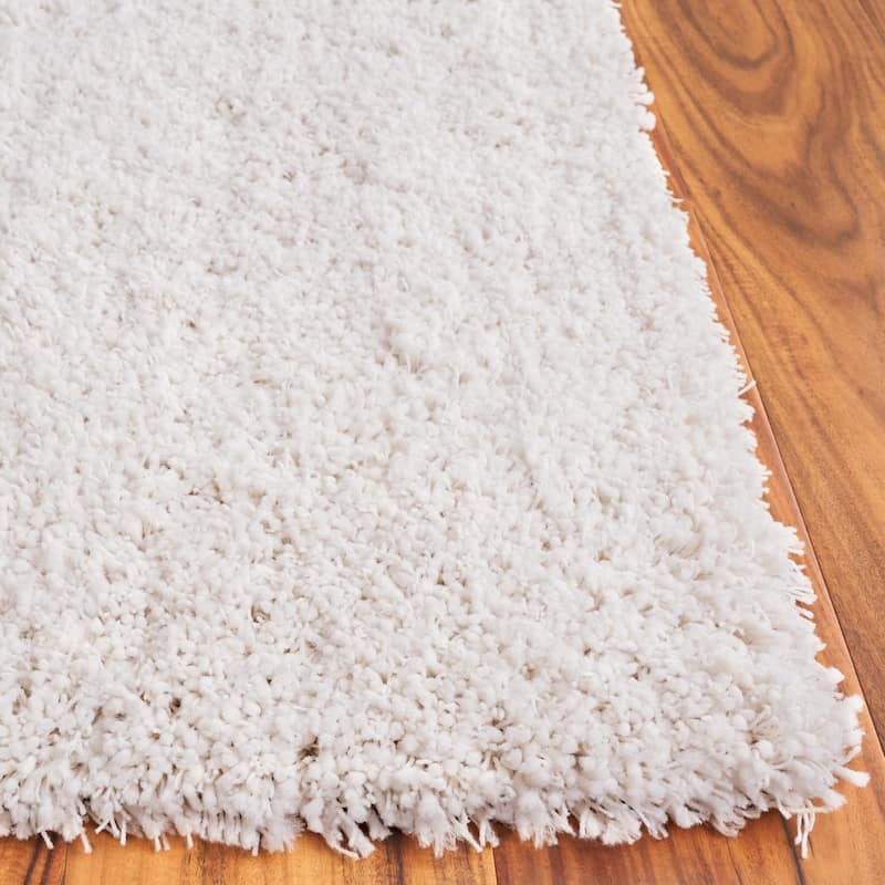SAFAVIEH Handmade Luxe Gianna Gezina Shag Rug