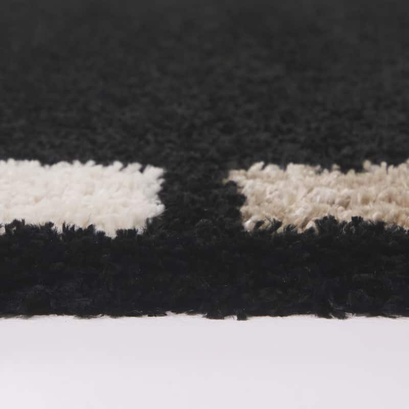 Rohan Geometric Border Area Rug