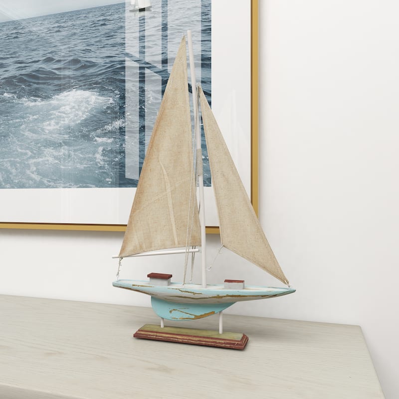 Blue Wood Distressed Sail Boat Decorative Sculpture with Cream Linen Sails and Brown Accents