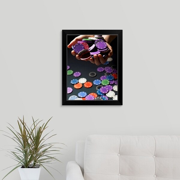 "Person holding handful of gambling chips, close-up" Black Framed Print