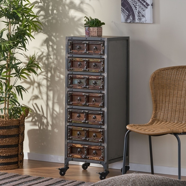 Muntz Handcrafted Boho Wooden 7 Drawer Chest by Christopher Knight Home - 15.75" L x 13.75" W x 43.75" H. Opens flyout.