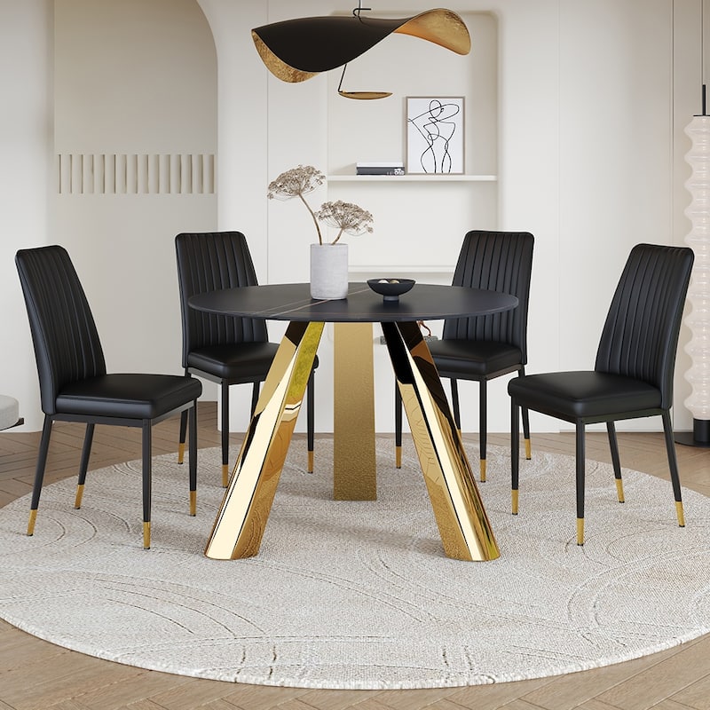 A 42-Inch Round Black Dining Table With A Granite Top And Stainless Steel Legs, Paired With Four Pu Material Dining Chairs
