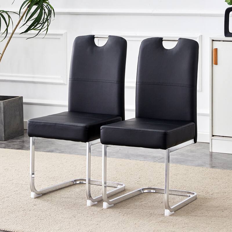 A set of 4 white PU material bow-shaped chairs - Adding fashion to minimalist and contemporary home styles