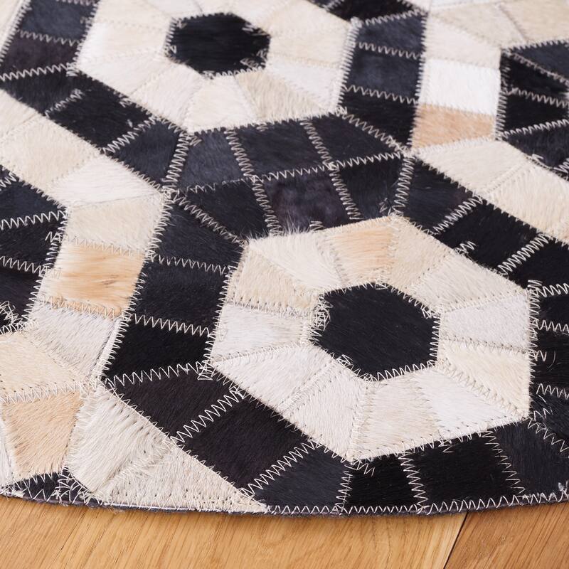 SAFAVIEH Handmade Studio Leather Alesha Mid-Century Modern Rug