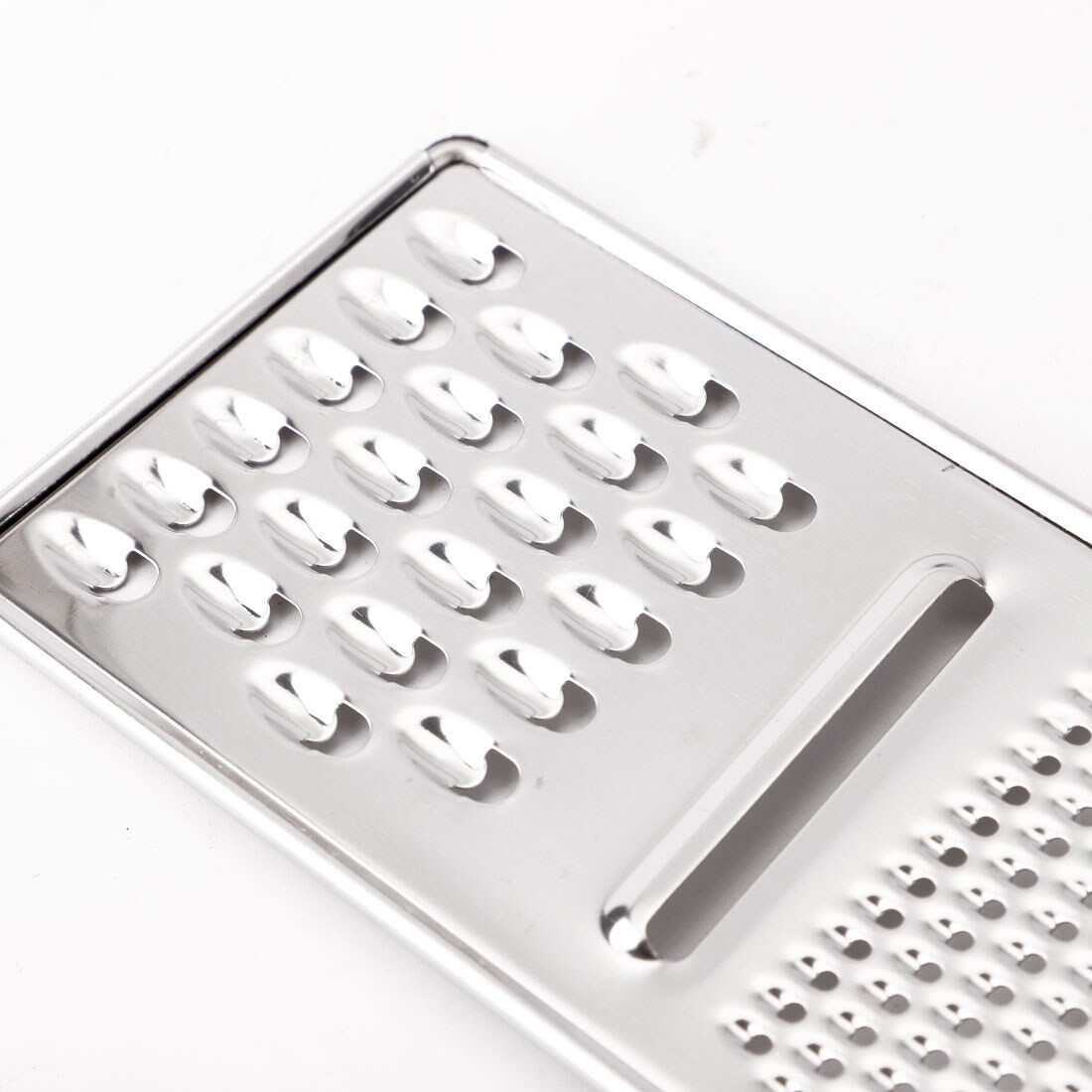 https://ak1.ostkcdn.com/images/products/is/images/direct/4d48f38ee0904710c544e72c5f2dfc4488c1d4a6/Kitchen-Restaurant-Metal-Cheese-Grater-Slicer-Peeler-Shredder-Tool-Silver-Tone.jpg